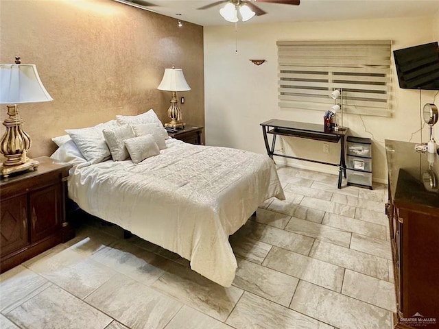 bedroom featuring ceiling fan