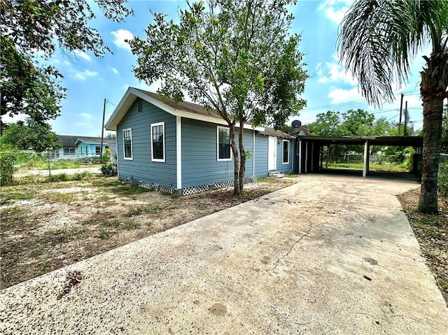 view of front facade featuring a carport