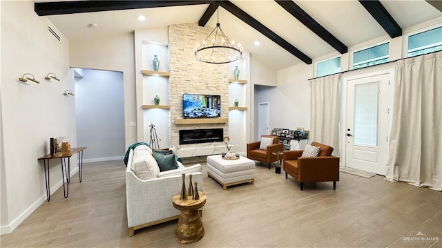 2800 Encke Rd, Mission, TX 78574 - living room with beam ceiling, light wood-type flooring, high vaulted ceiling, a chandelier, and built in shelves
