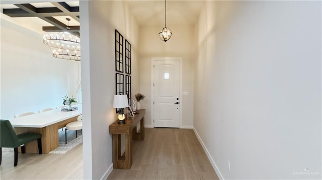 2800 Encke Rd, Mission, TX 78574 - foyer with a chandelier, coffered ceiling, light wood-style floors, beamed ceiling, and a high ceiling