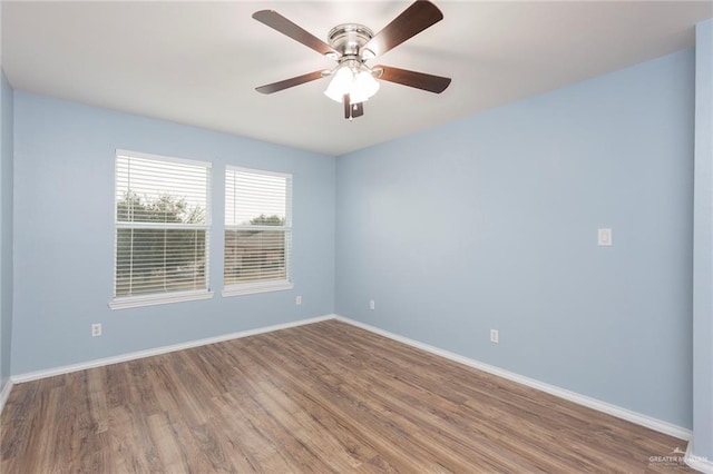 unfurnished room featuring wood-type flooring and ceiling fan