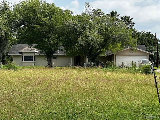 view of yard featuring a garage