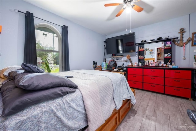 bedroom featuring ceiling fan and light wood-type flooring