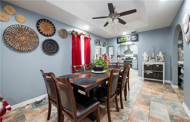 dining room featuring ceiling fan