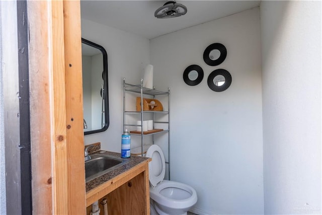 bathroom with sink and toilet