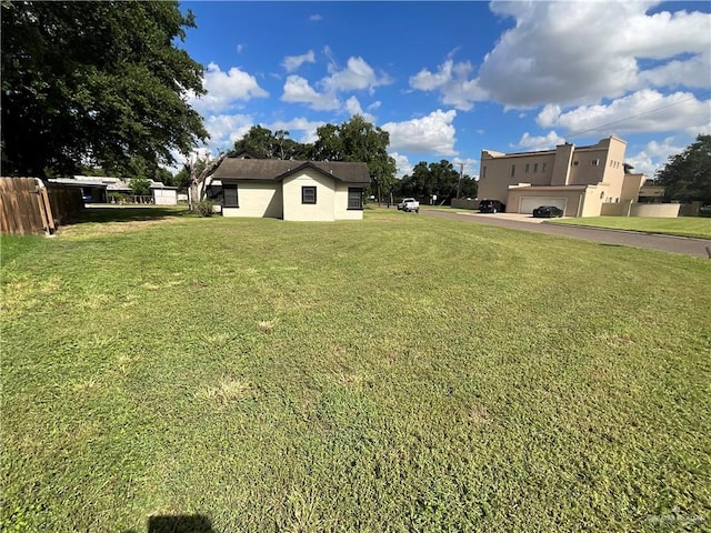 view of yard with a garage