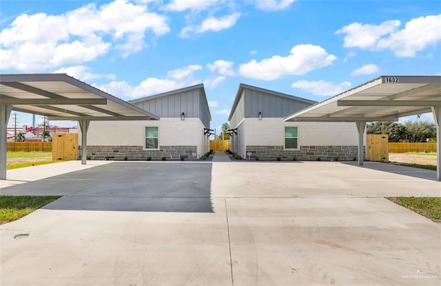 exterior space featuring a carport