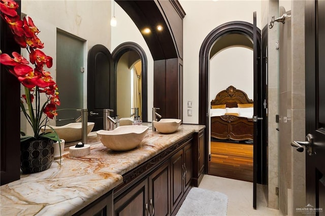 bathroom featuring vanity and wood-type flooring