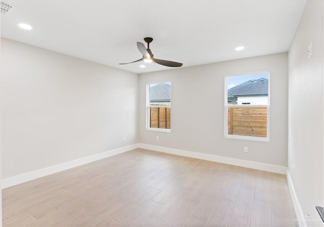3925 S Mullin Ave, Edinburg, TX 78542 - spare room featuring light wood-style floors, ceiling fan, and recessed lighting