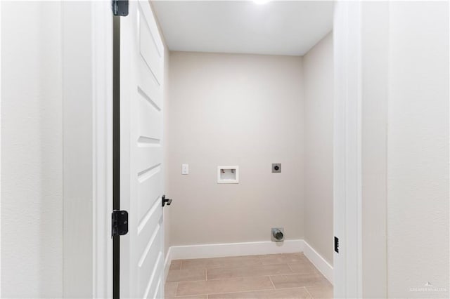 3925 S Mullin Ave, Edinburg, TX 78542 - laundry area featuring electric dryer hookup, washer hookup, and wood tiled floors