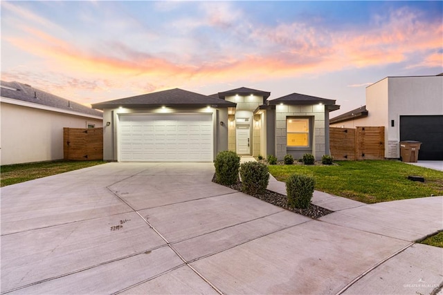 3925 S Mullin Ave, Edinburg, TX 78542 - view of front of home featuring stucco siding, driveway, and an attached garage