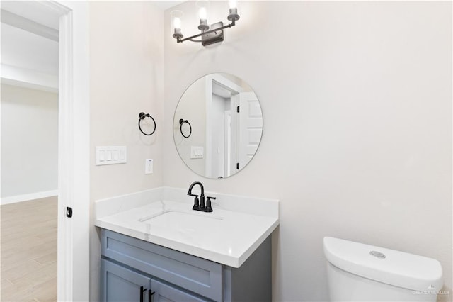3925 S Mullin Ave, Edinburg, TX 78542 - bathroom featuring vanity and wood finished floors