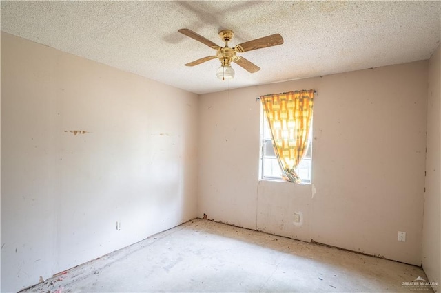 unfurnished room featuring a textured ceiling and ceiling fan