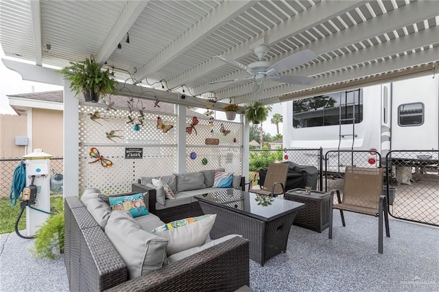view of patio / terrace featuring fence, a pergola, and an outdoor living space