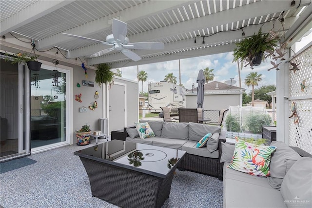 view of patio / terrace with an outdoor living space and ceiling fan