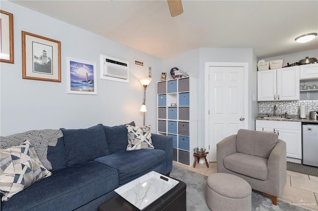 living area with light tile patterned floors, a wall mounted AC, and wet bar