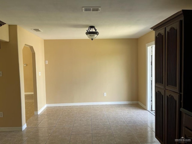 view of tiled spare room