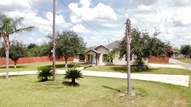 view of front facade with a front yard