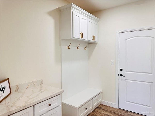 2201 Blue Sky Dr, Weslaco, TX 78599 - mudroom featuring wood finished floors and baseboards