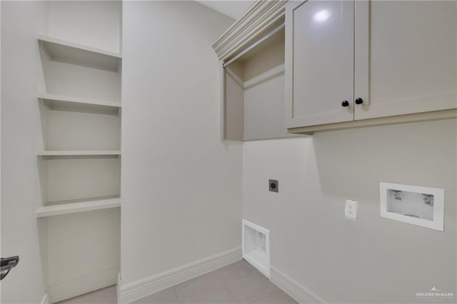 clothes washing area with light tile patterned floors, baseboards, washer hookup, and electric dryer hookup