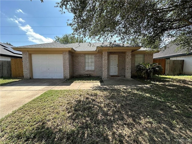 8802 N 29th Ln, Mcallen, TX 78504 - ranch-style home with brick siding, an attached garage, and driveway