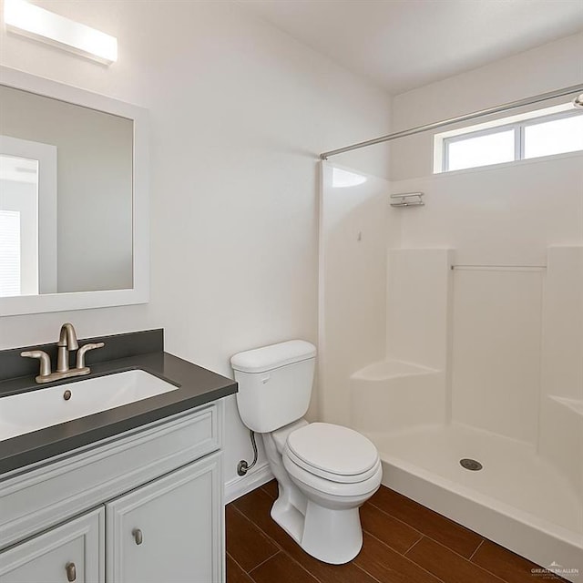8802 N 29th Ln, Mcallen, TX 78504 - bathroom with vanity, a shower, and wood tiled floors