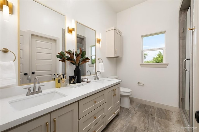 3721 Diamondhead Ave, Alton, TX 78573 - bathroom featuring double vanity, a shower stall, and marble finish flooring