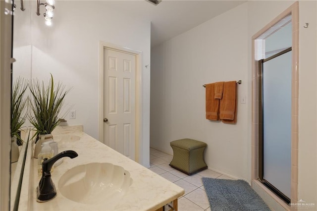 408 E Newport Ln, Mcallen, TX 78501 - full bath featuring a stall shower, tile patterned floors, and double vanity