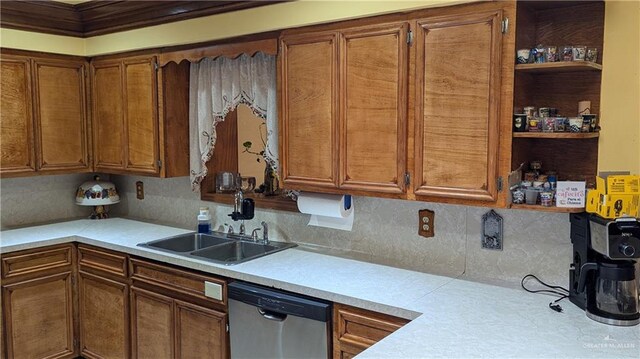 2104 Harvey St, Mcallen, TX 78501 - kitchen with stainless steel dishwasher, open shelves, brown cabinets, light countertops, and a sink