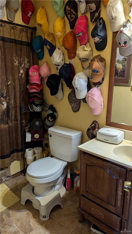 2104 Harvey St, Mcallen, TX 78501 - bathroom with toilet and vanity