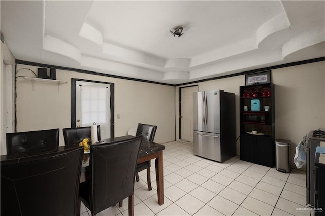 18315 Washington Palm Dr, Penitas, TX 78576 - dining room with a tray ceiling and light tile patterned floors