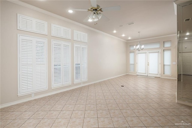 tiled spare room featuring ceiling fan with notable chandelier and ornamental molding