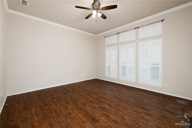 spare room featuring dark hardwood / wood-style flooring, ceiling fan, and ornamental molding