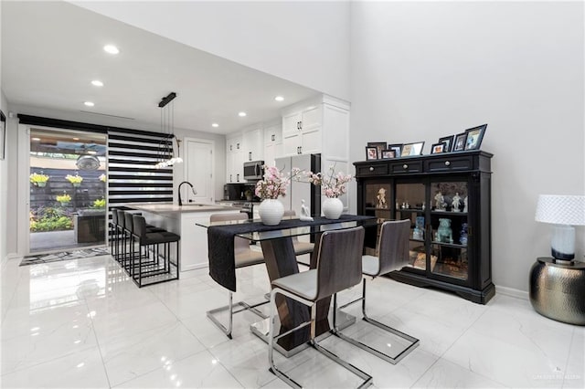 2215 Corales St, Mission, TX 78573 - dining area featuring recessed lighting and light marble finish floors