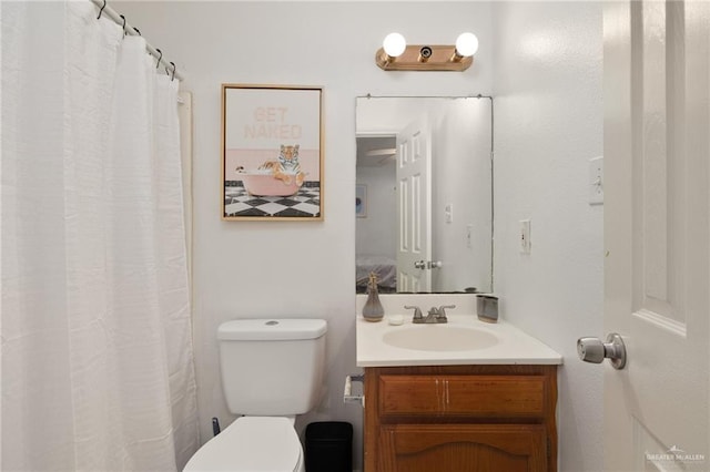 full bath with toilet and vanity