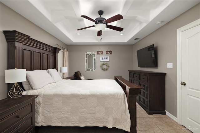 bedroom with light tile patterned floors, a ceiling fan, baseboards, a tray ceiling, and recessed lighting