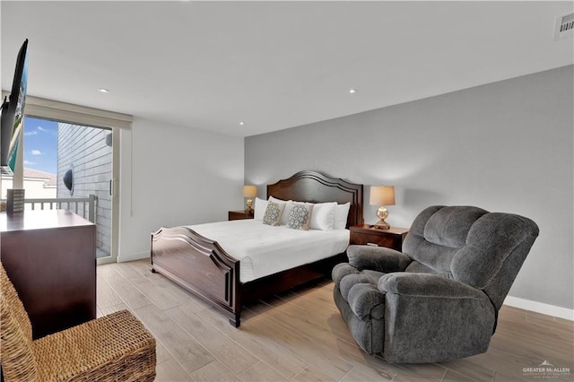 bedroom with light wood-type flooring, baseboards, access to outside, visible vents, and recessed lighting