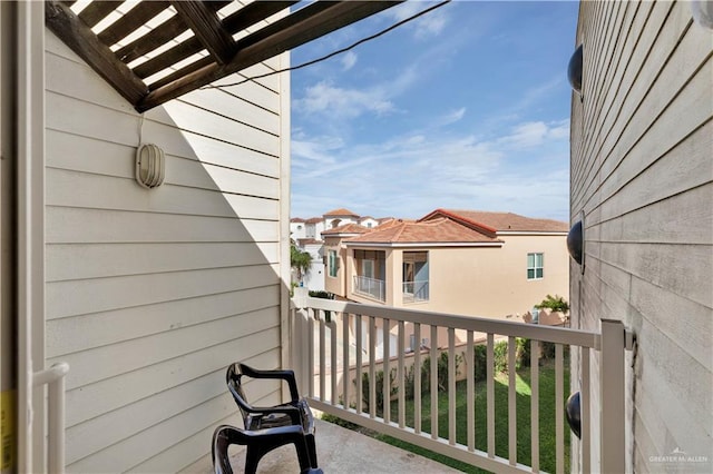 balcony featuring a residential view