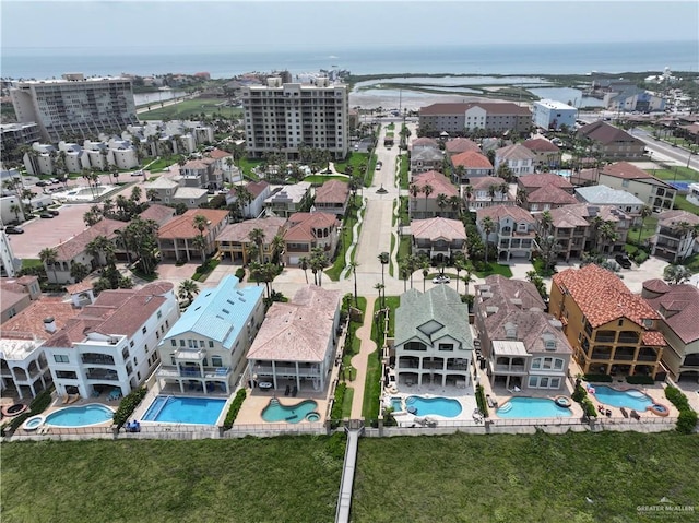 6503 Fountain Way S, Padre Island, TX 78597 - bird's eye view of a pool area and a nearby body of water