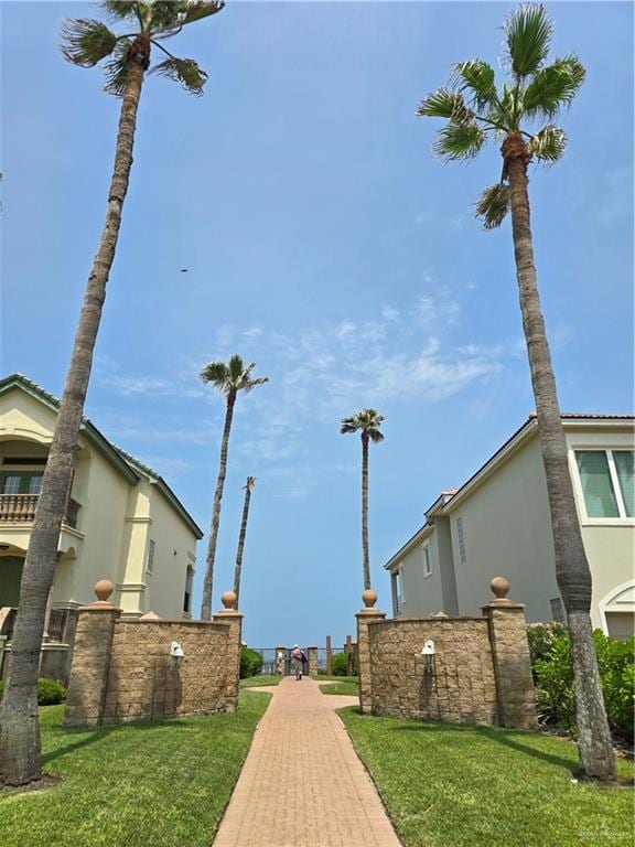 6503 Fountain Way S, Padre Island, TX 78597 - view of property's community with a lawn