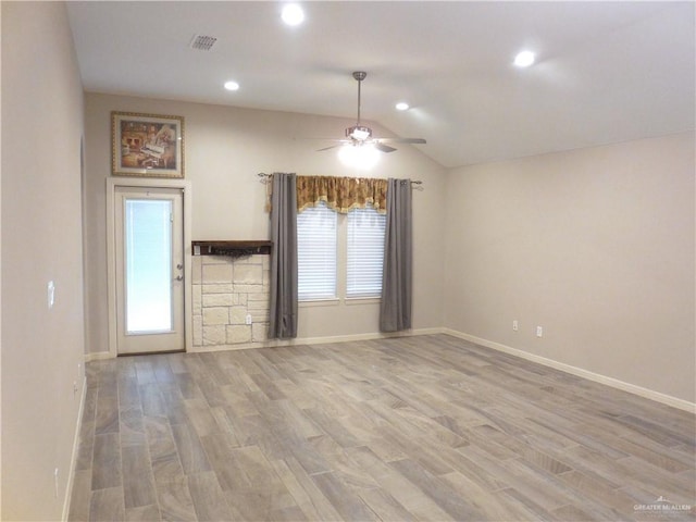 502 Castillos Y Diamantes St, Mission, TX 78572 - unfurnished living room featuring wood finished floors, a ceiling fan, vaulted ceiling, baseboards, and recessed lighting