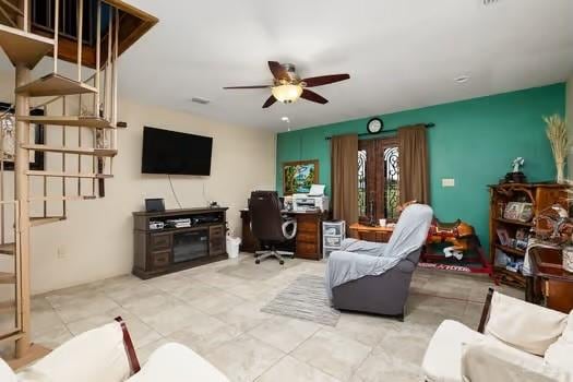 living room featuring ceiling fan