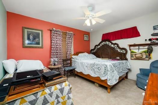 bedroom featuring carpet floors and ceiling fan