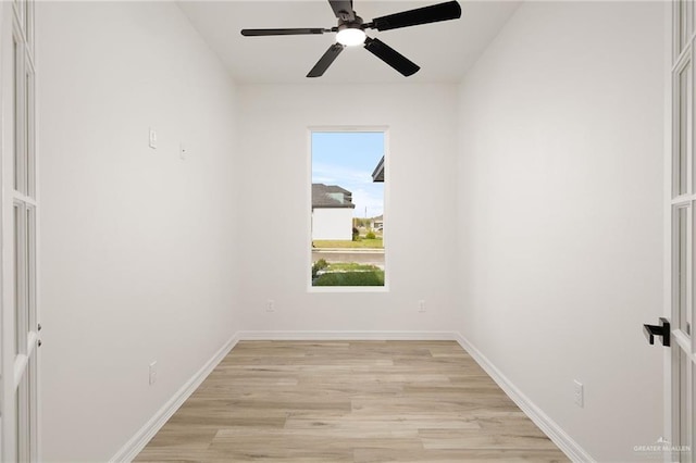 unfurnished room with ceiling fan and light hardwood / wood-style floors