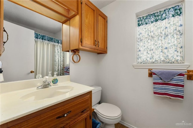 406 Sagittarius St, Mission, TX 78572 - full bathroom featuring toilet and vanity