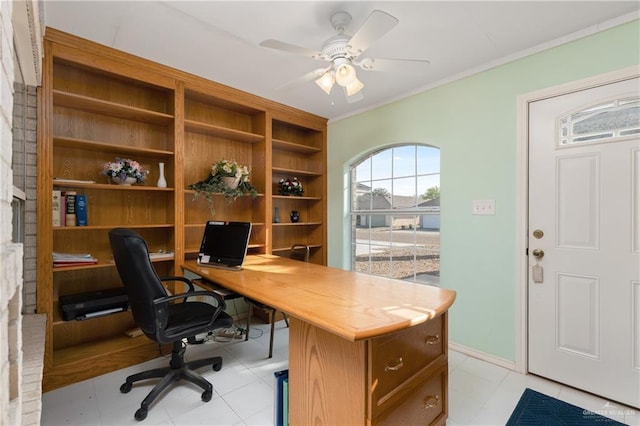 office featuring crown molding, a ceiling fan, and baseboards