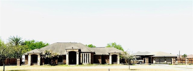 524 S Mile 2 W, Mercedes, TX 78570 - view of front of home featuring fence