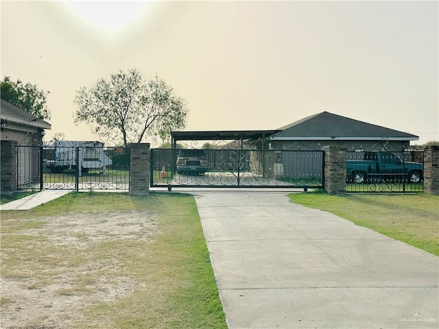 524 S Mile 2 W, Mercedes, TX 78570 - view of gate with a yard and fence