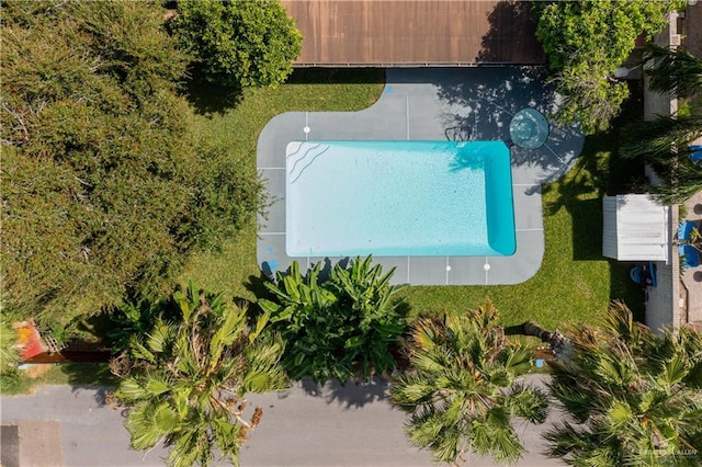 drone / aerial view of a pool