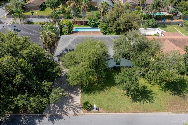 aerial perspective of suburban area with a pool area